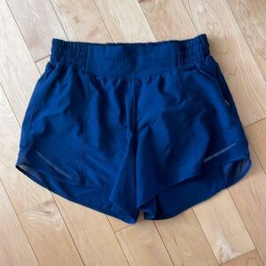 Navy lululemon high waisted hotty hot shorts 4”